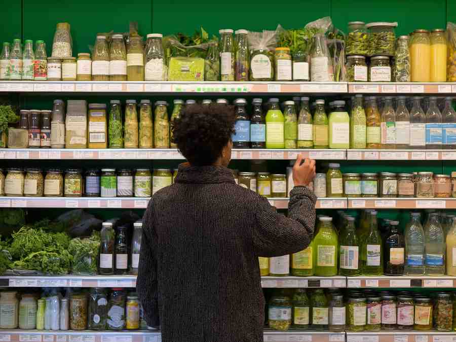 Grocery shopping aisle with various food options